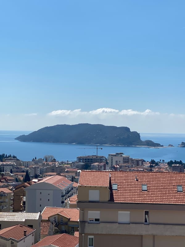 Daytime aerial views captured of Budva's coastal cityscape