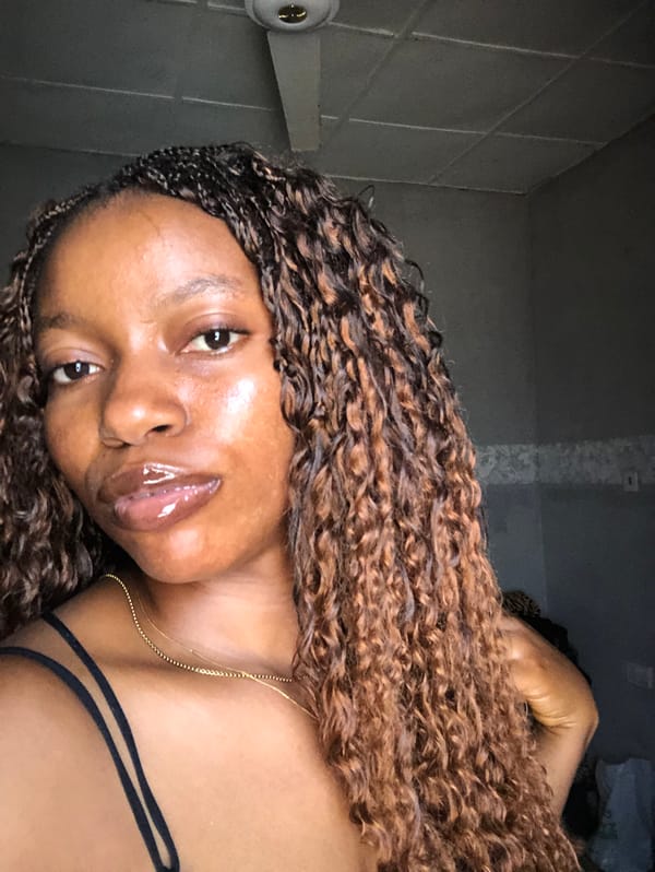 Woman photographed indoors in Nigeria during brief timespan