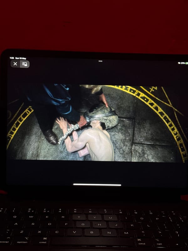 Tablet displays helmet scene in Sofia office setting