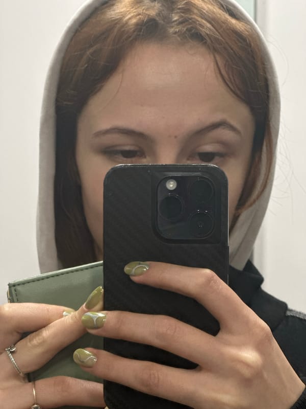 Person documents manicure session and selfies in Novi Sad