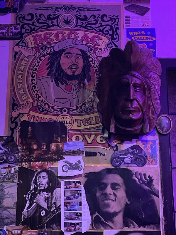 Late-night stop at a Chalong reggae bar with two bikes