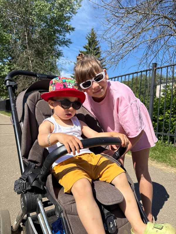 Family selfie moment with children in strollers, Rusanovo Russia