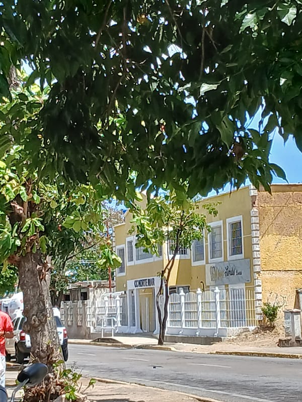Street scenes and traditional empanada meal documented in Juan Griego