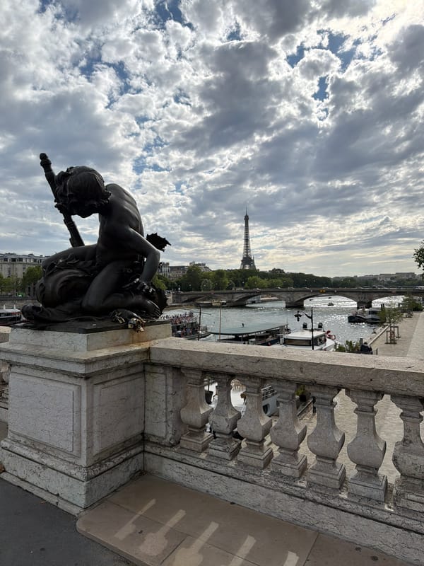 Bronze merman sculpture on Pont des Arts, Paris