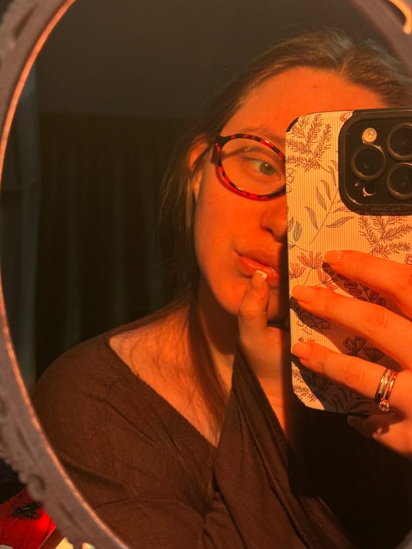 Person takes multiple mirror selfies in Krasnodar home
