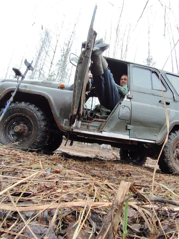 Man documented with military vehicle in Russian woodland