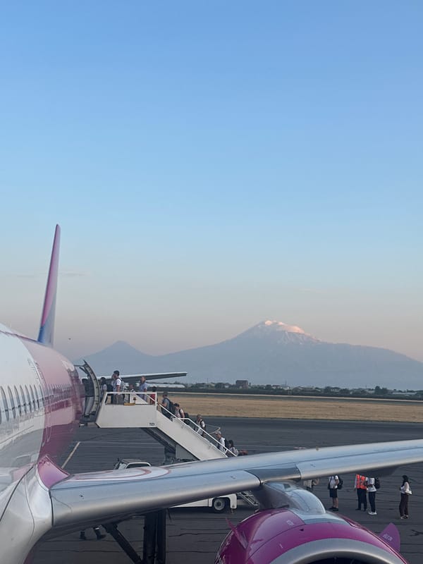 Wizz Air's pink livery up close on the tarmac
