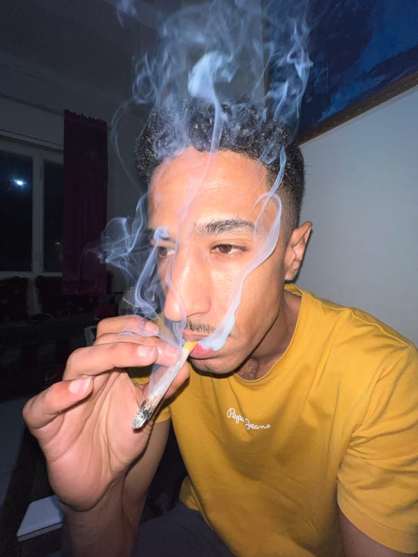 Person smoking joint in Tangier early morning hours