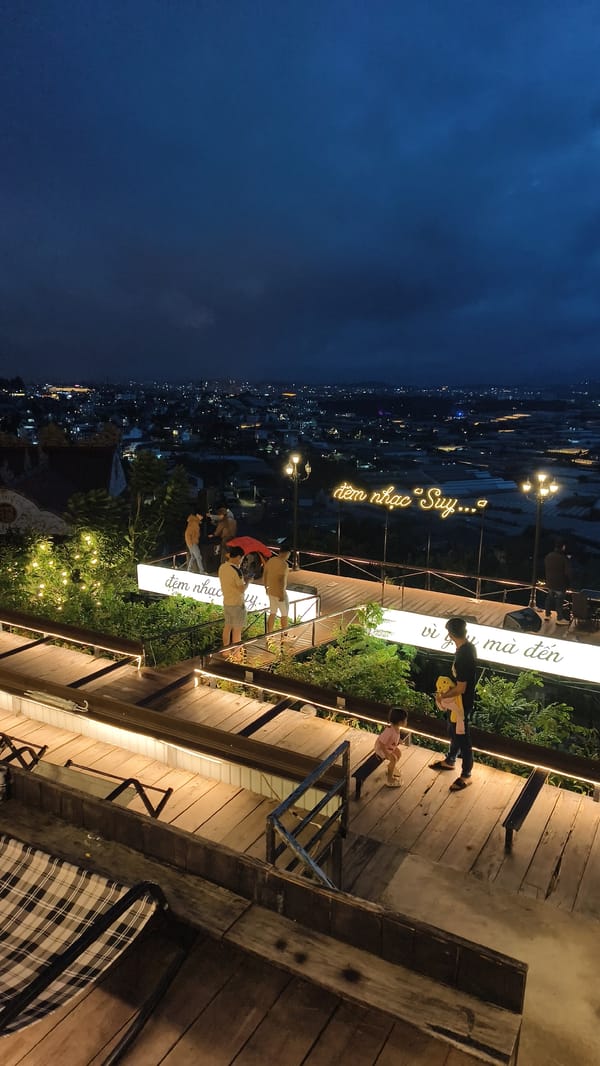 String-lit hilltop cafe with panoramic city views, Vietnam