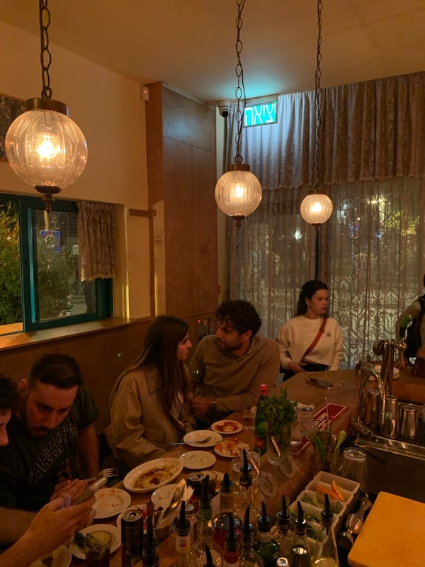 Tel-Aviv scenes: restaurant dining and street art captured