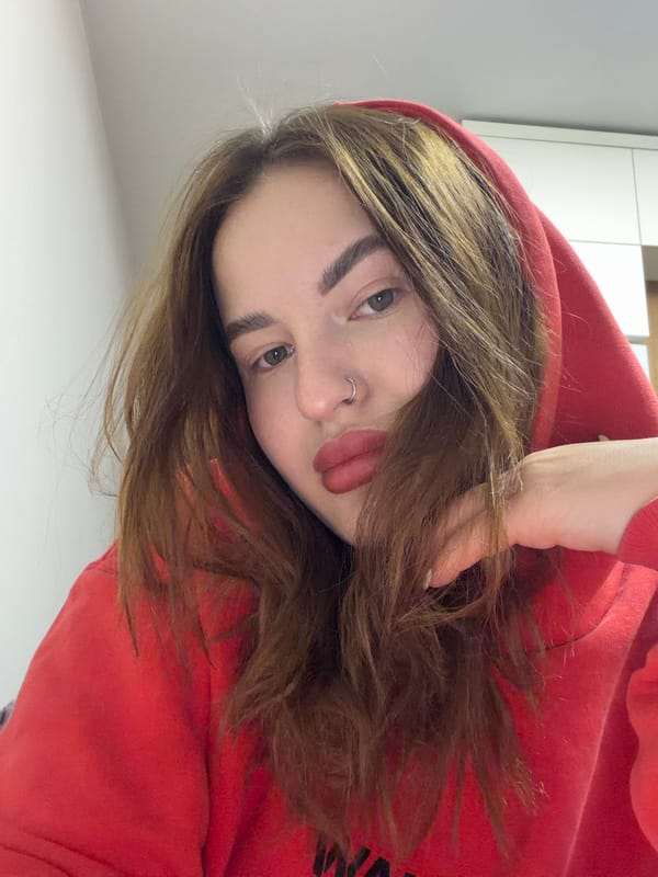 Woman photographed in multiple portrait poses in Krasnodar apartment