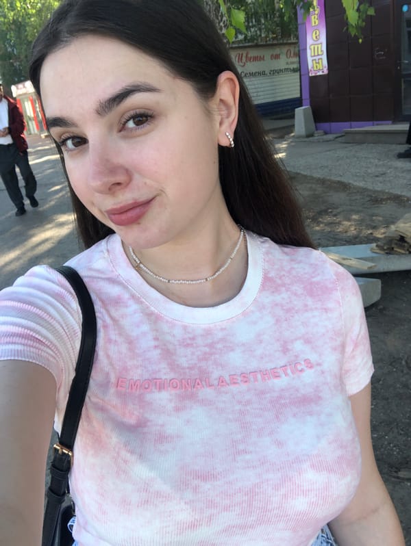 Woman takes early morning selfies near Magnit store in Russia