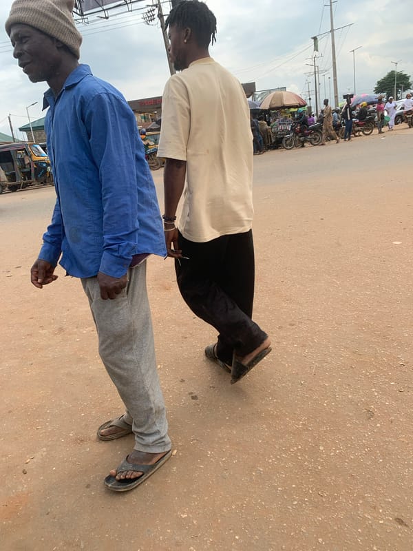 Foot traffic and street commerce on a Shagamu afternoon