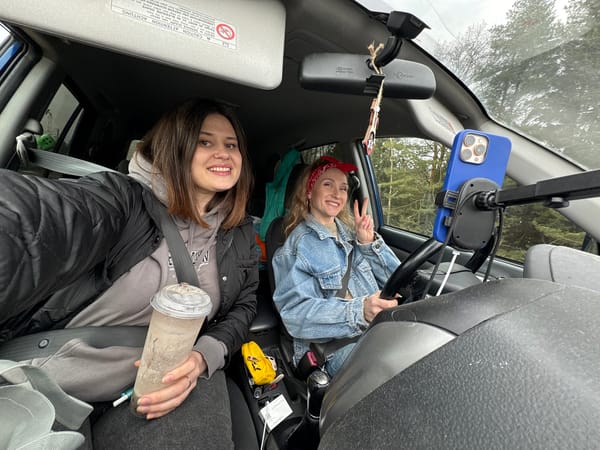 Two women pose in car in Chaikovsky, Russia