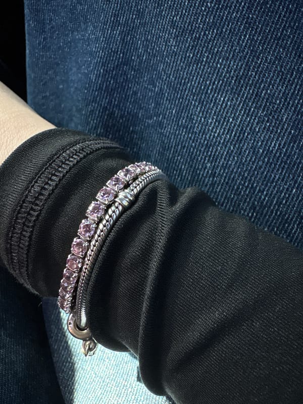Person photographed wearing silver bracelets in Plovdiv, Bulgaria