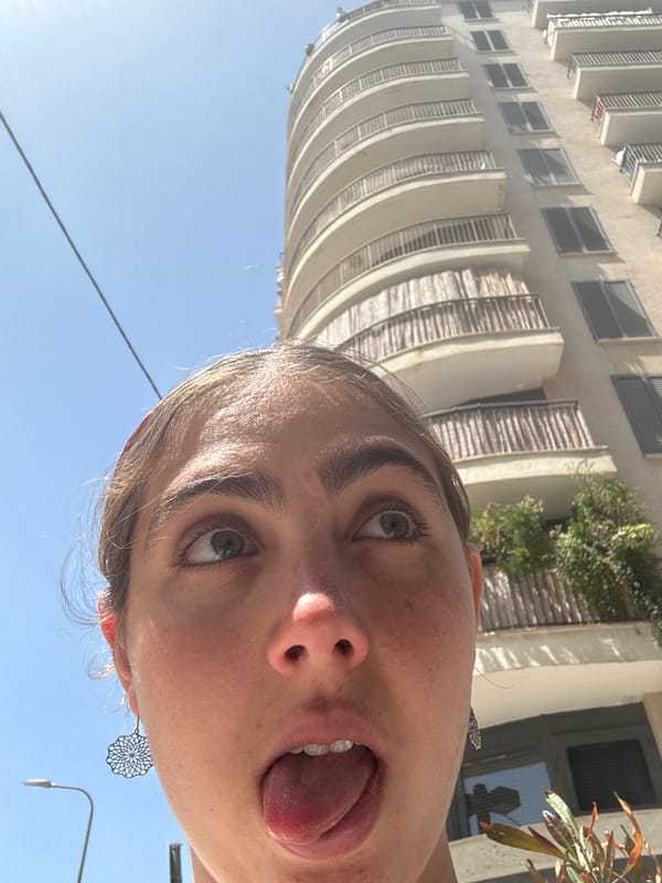 Woman documents morning moments in Tel Aviv street scene