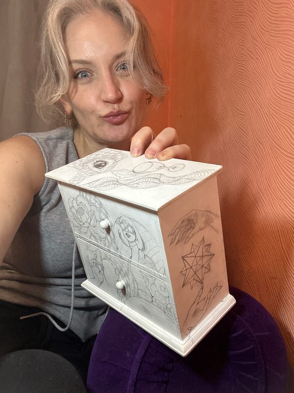 Hand-drawn pencil art decorates a wooden jewelry box in Kyiv