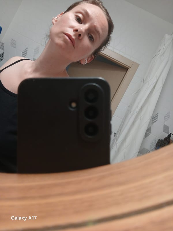 Woman takes bathroom mirror selfies in Yekaterinburg