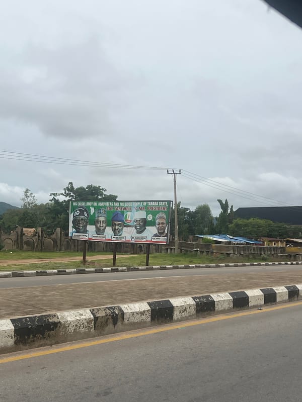 Street life documented in Jalingo, Nigeria during midday hour