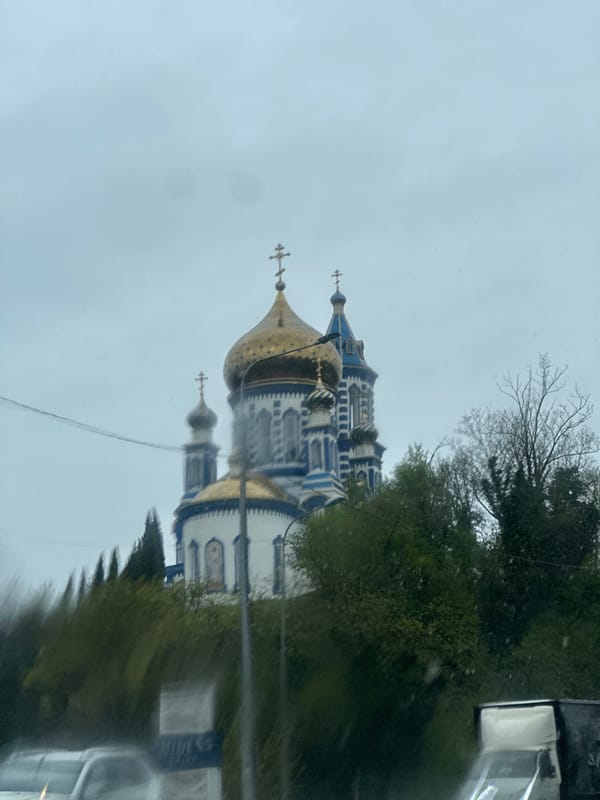 Morning scenes captured in Nebug: church photography and rainy road travel