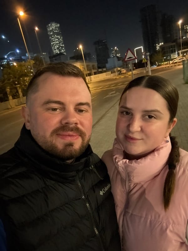 Couple documents evening outing in Dubai with selfies, cat