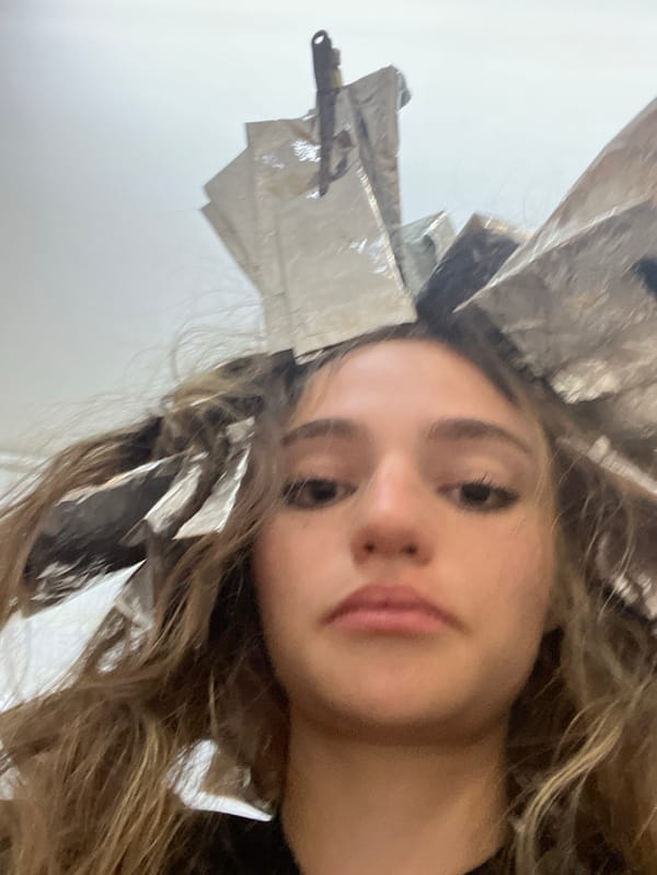 Woman receives hair treatment at Puebla salon