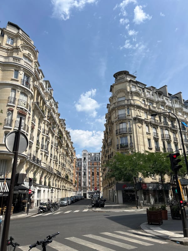 Haussmannian streetscape on a sunny Bastille Day in Paris