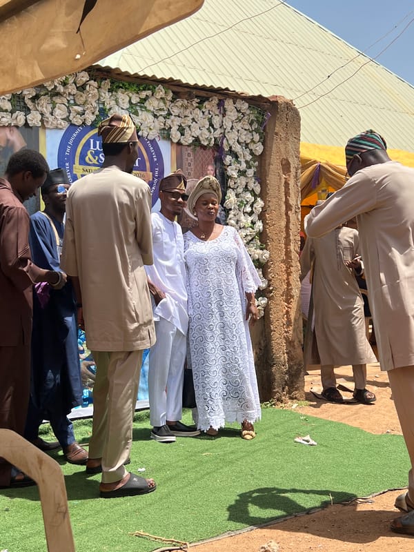 Community celebration with formal gathering in Rigasa, Nigeria