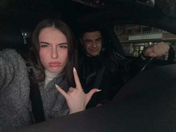 Couple poses for photos inside car in Plovdiv