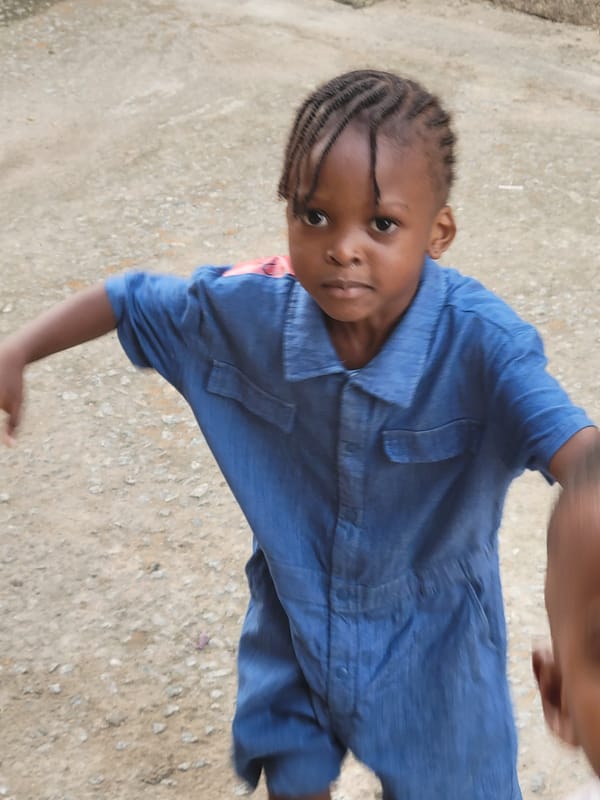 Children play in courtyards as daily life continues in Nigerian communities