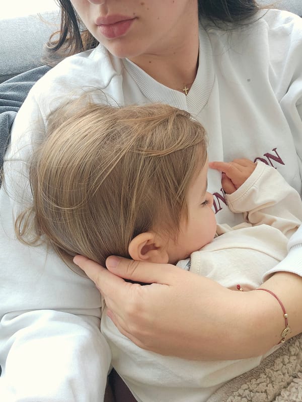 Mother and child share quiet moment in Pomorie home