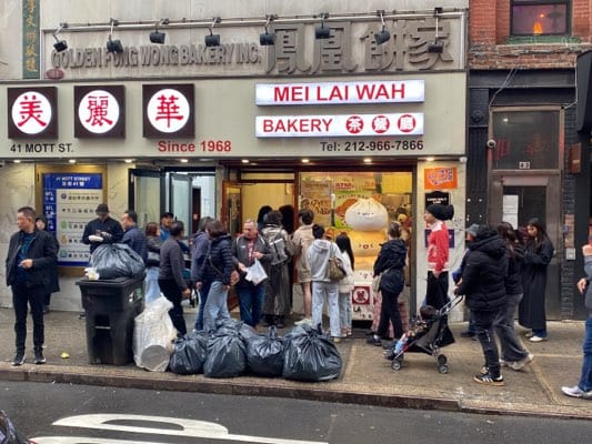 Evening scenes documented in NYC Chinatown food district