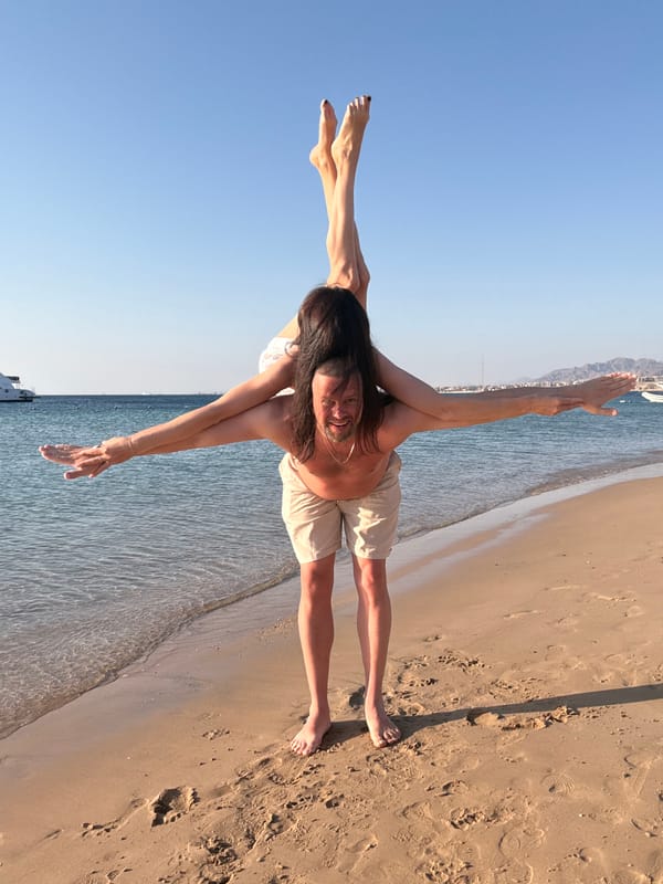 Acrobatic duo performs beach yoga in Safaga, Egypt