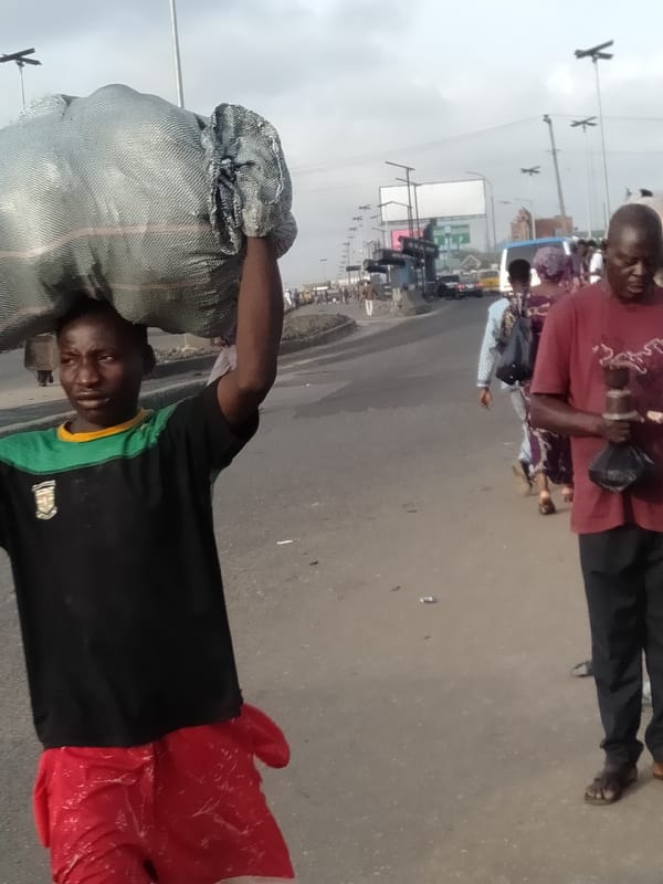 Morning street activity documented in Shangisha, Nigeria