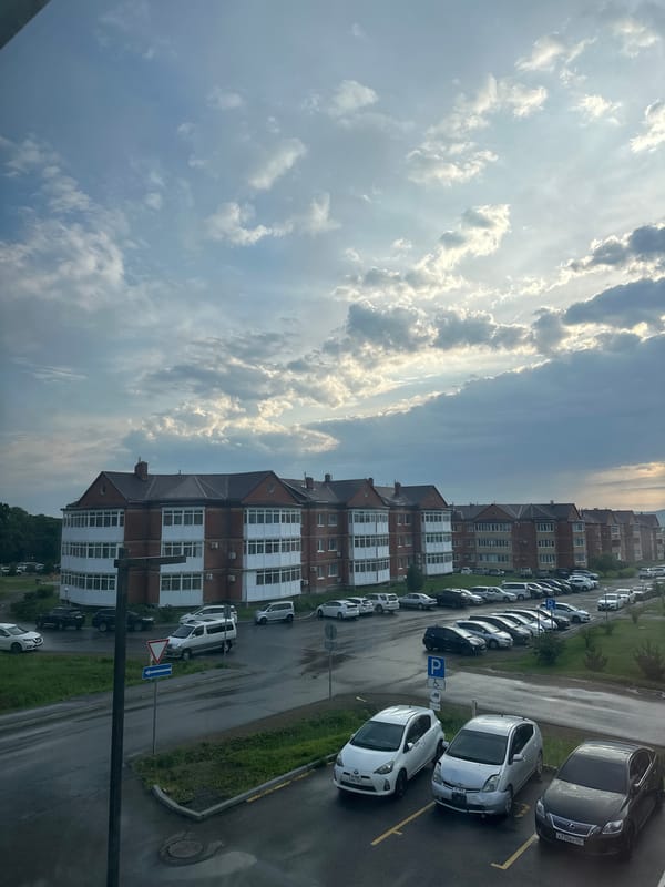 Everyday scenes documented in Ussurijsk including biplane sighting