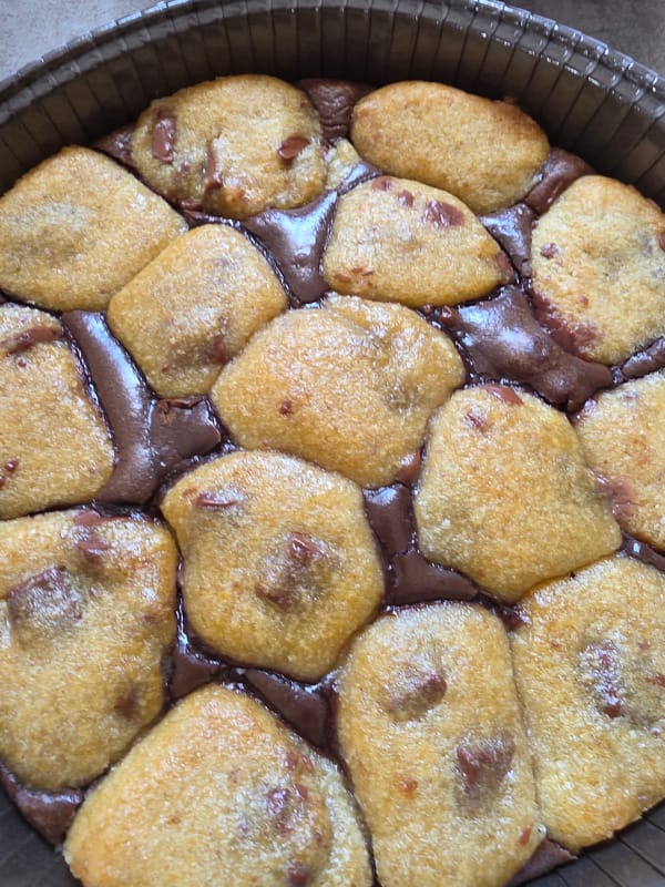Hybrid brownie-cookie dessert photographed in round baking pan