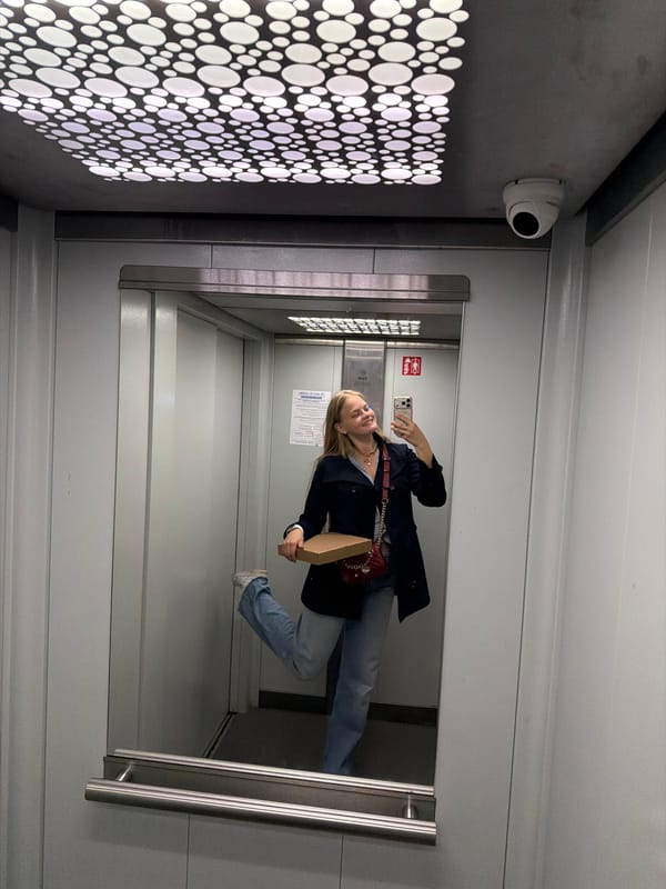 Personal moments documented in Izhevsk elevator and floral arrangement