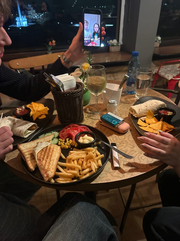 Diners video call during meal at Veliko Tarnovo restaurant