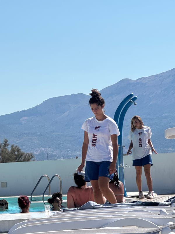 Pool day at a Sicilian resort, staff and guests in full swing