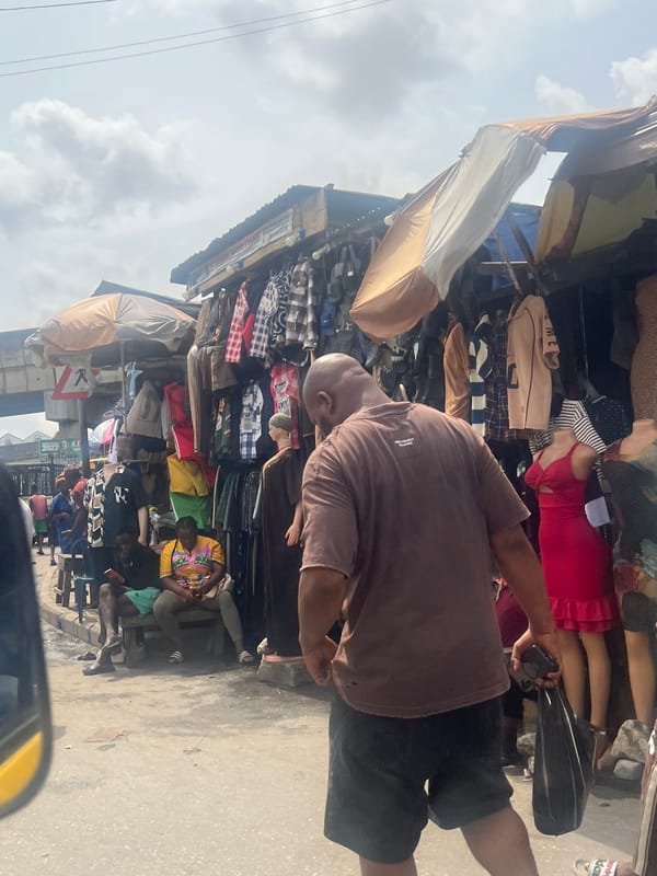 Market shopping and motorcycle traffic captured in Nigerian towns