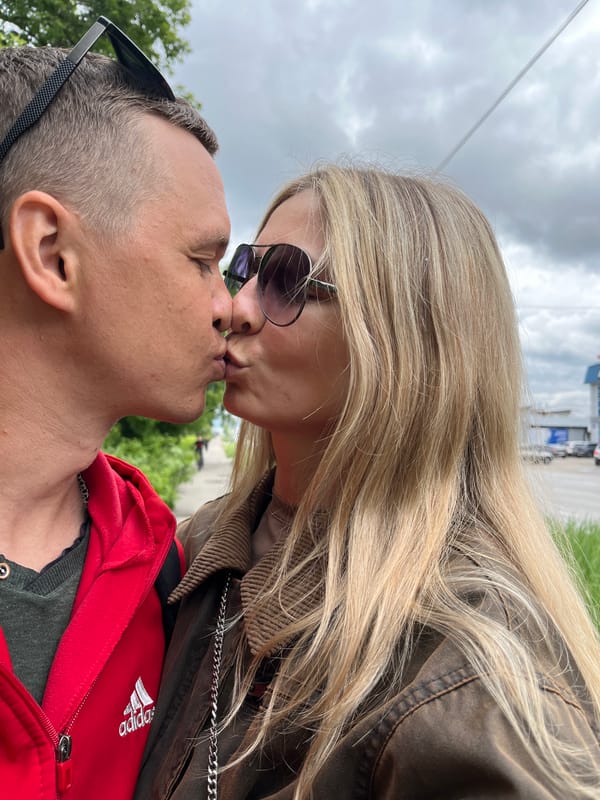 Couple documents casual morning outing through Chaikovsky, Russia streets