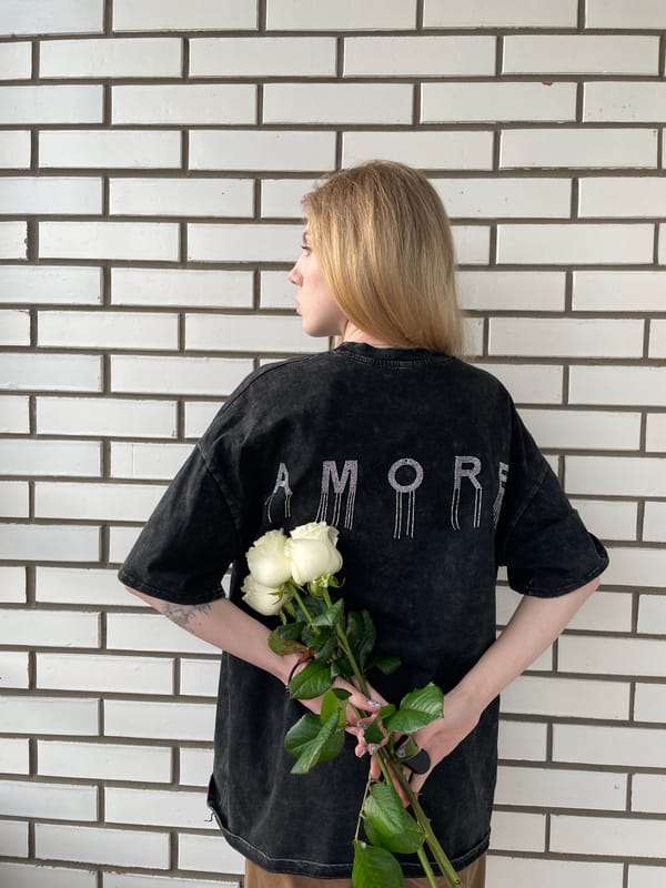 Woman poses with roses in romantic photo session in Izhevsk