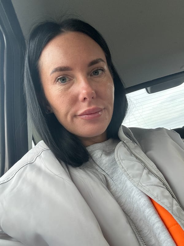 Woman takes selfie in car in Ольховка, Russia