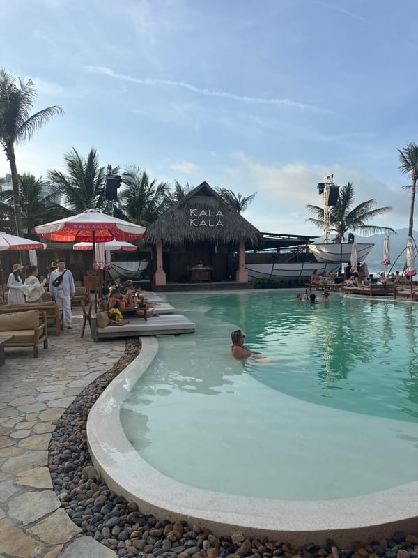 Beach club patrons enjoy pool activities at Kala resort