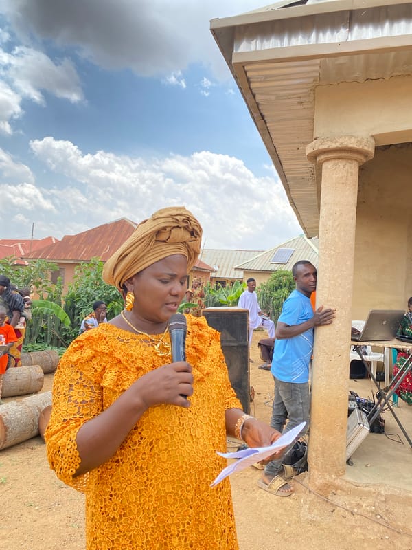 Woman delivers speech at traditional gathering in Nigerian community