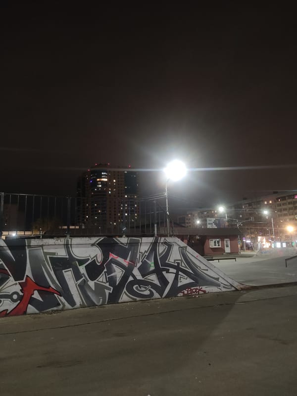 Nighttime graffiti scene documented at Reutov skatepark