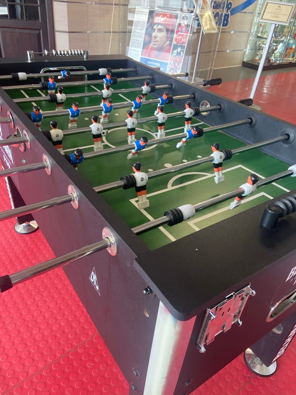 Visitor documents recreational facility with Soviet hockey memorabilia in Peresvet