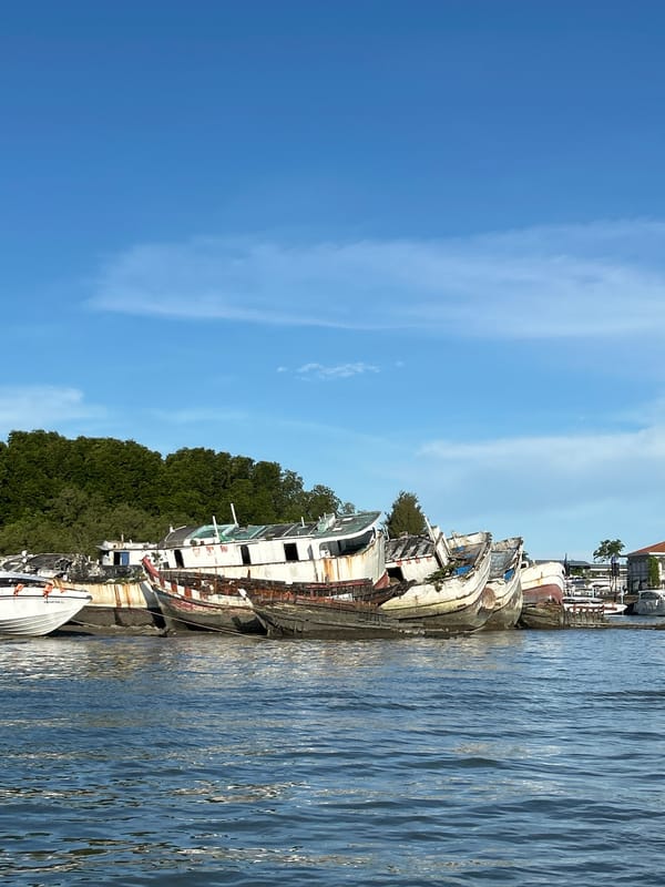Weathered boats documented in Ratsada Thailand harbor waters