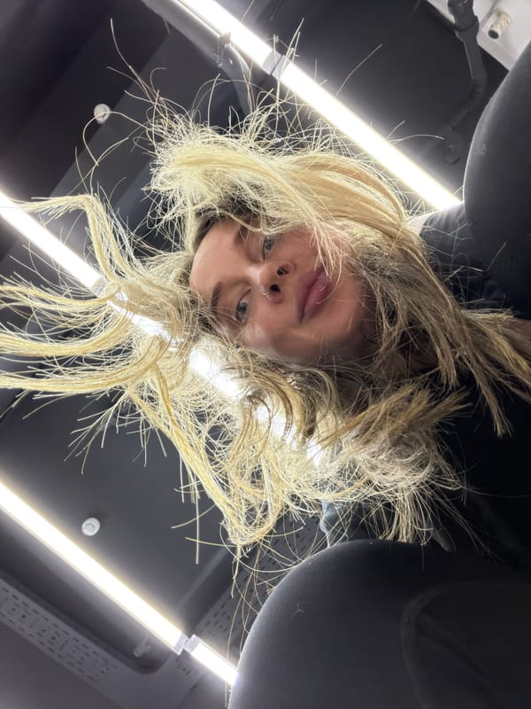 Woman with nose piercing photographed indoors in Moscow
