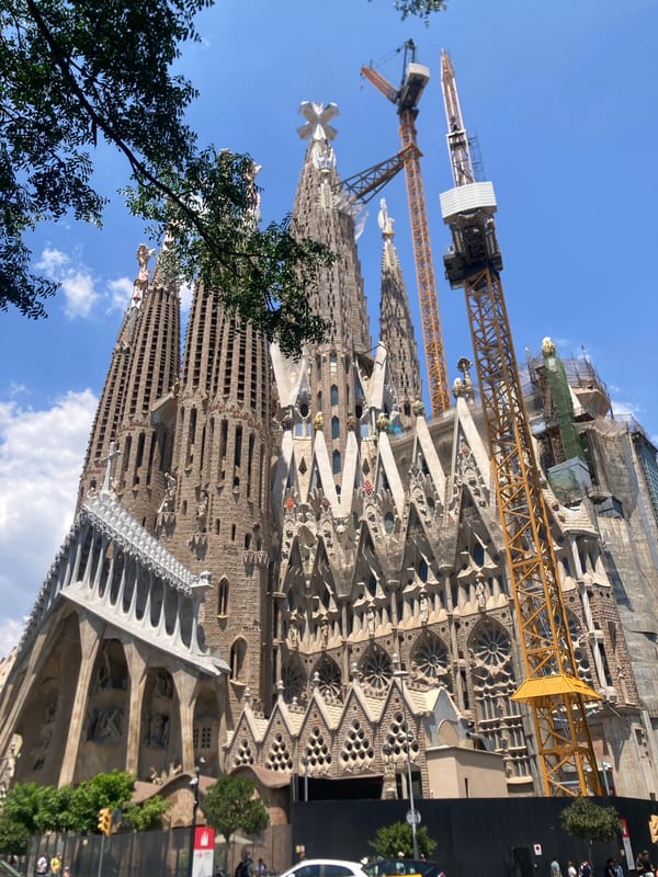 Up close with the Sagrada Família mid-construction on a clear day